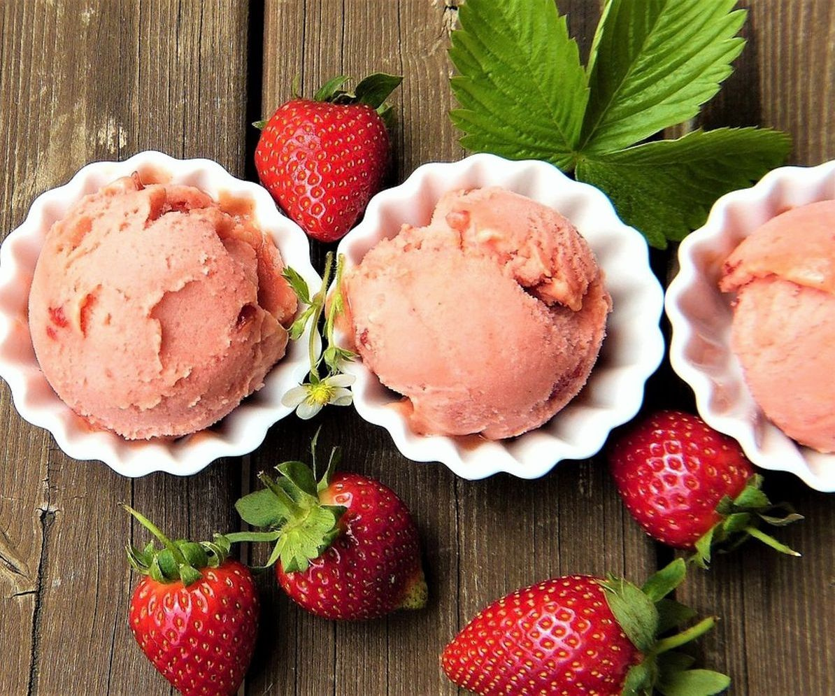 The gelato display case filled with vibrant, freshly made flavors
